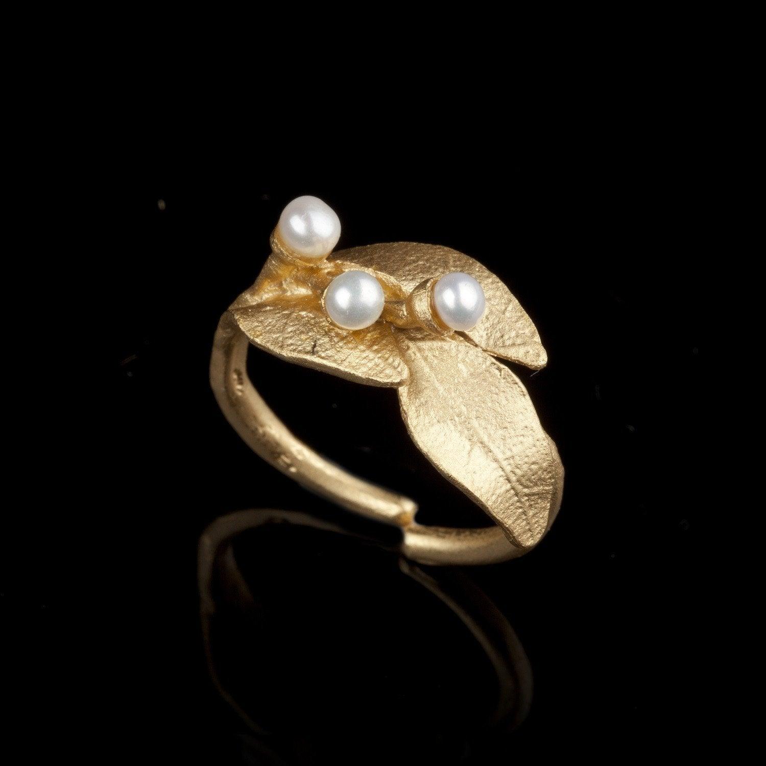 The Bay Laurel ring is cast in bronze with 24kt. gold plate and accented with white freshwater pearls.